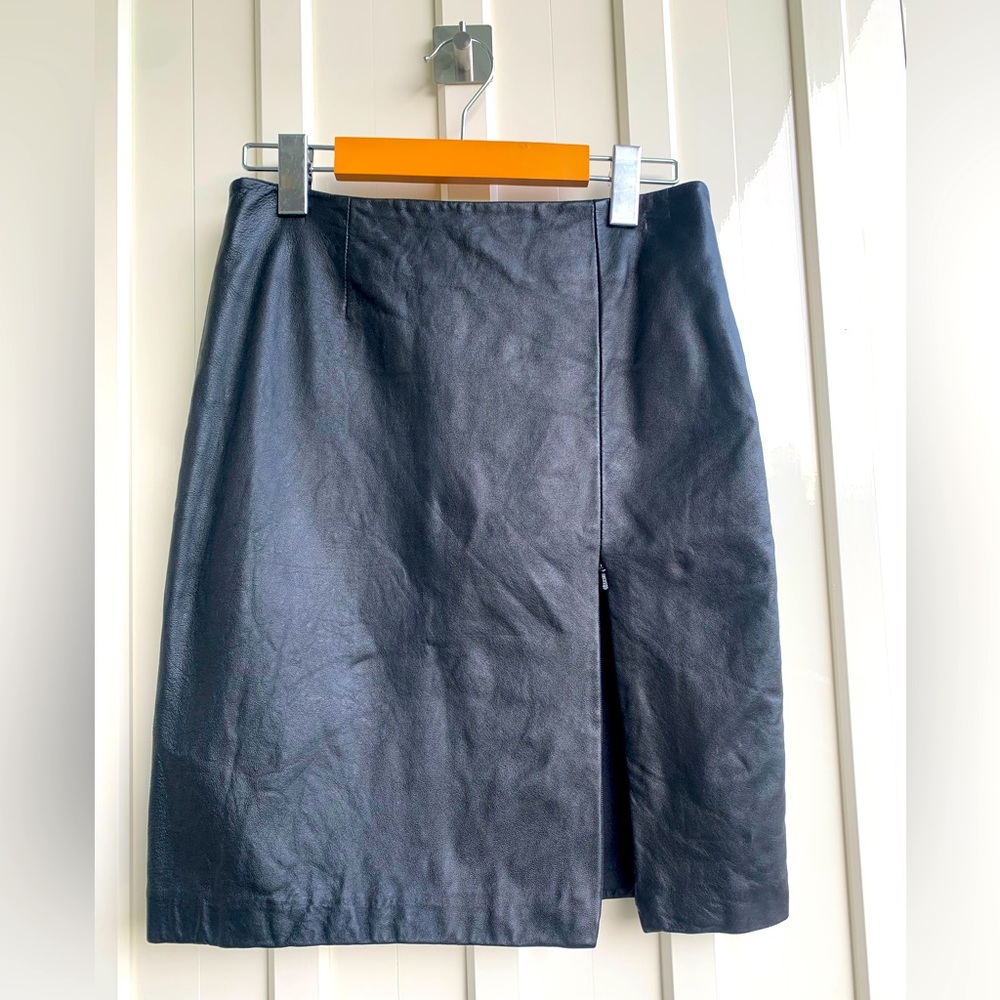 Genuine black leather skirt with zippered thigh slit